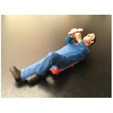 Hombre mecánico tumbado con peto azul - Miniatura 1:32 - ADF 32107
